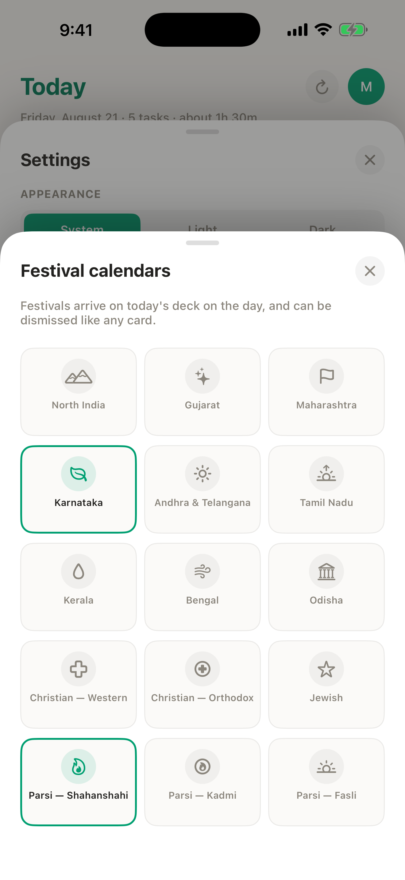 The festival calendars grid with Karnataka and Parsi — Shahanshahi selected.